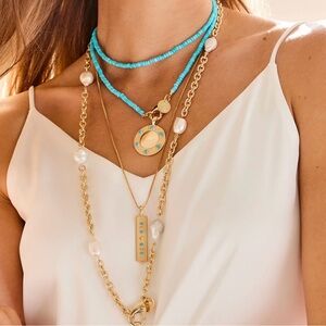 Jane Win around the sun turquoise pendant